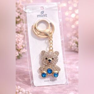 Gold Teddy Bear Keychain with Blue Gem Accents
